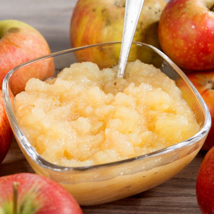 an applesauce with apples on a wooden table; Shutterstock ID 761557831; Job (TFH, TOH, RD, BNB, CWM, CM): Taste of Home