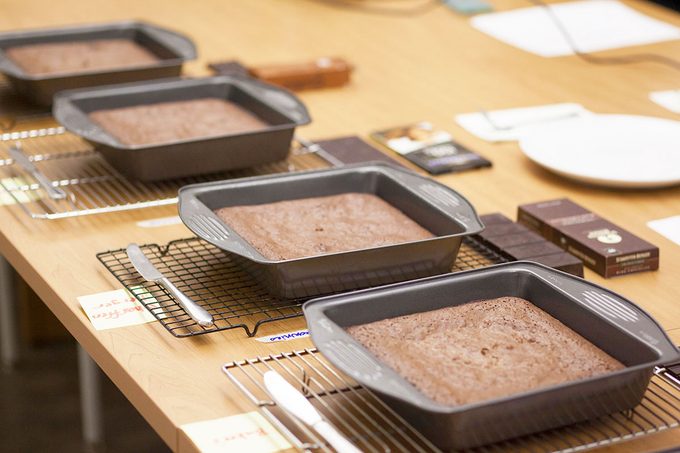 Line up of brownies in their pans