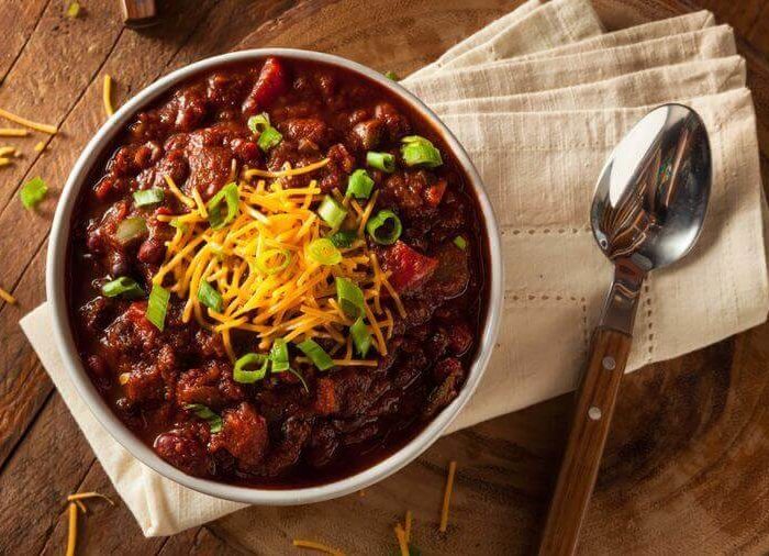 Bowl of chili with cheese on top