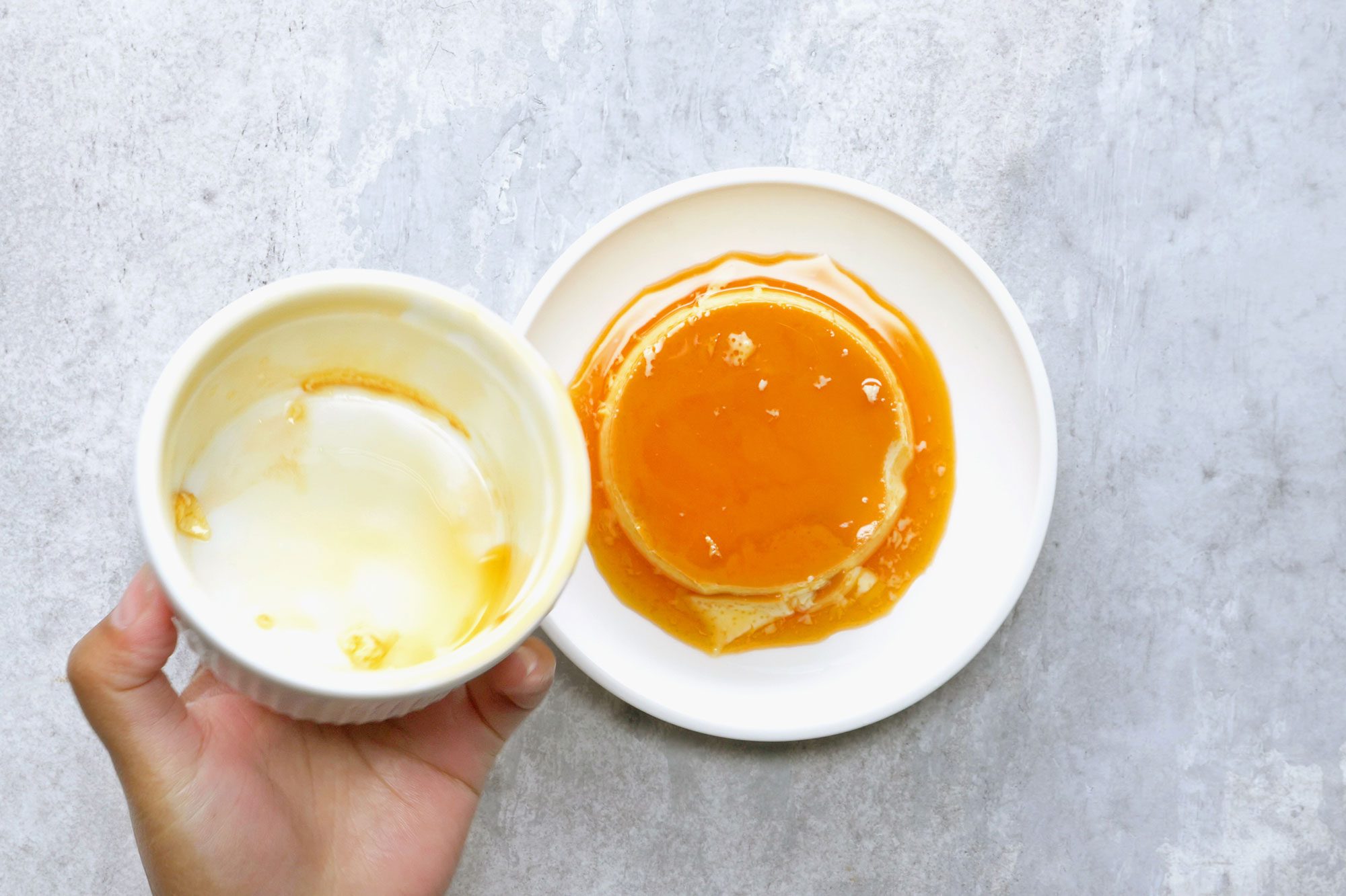 Place a small plate upside down on top of the cup and flip them