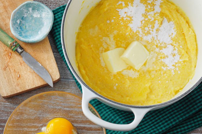 Cornmeal mixture with butter in a large pan