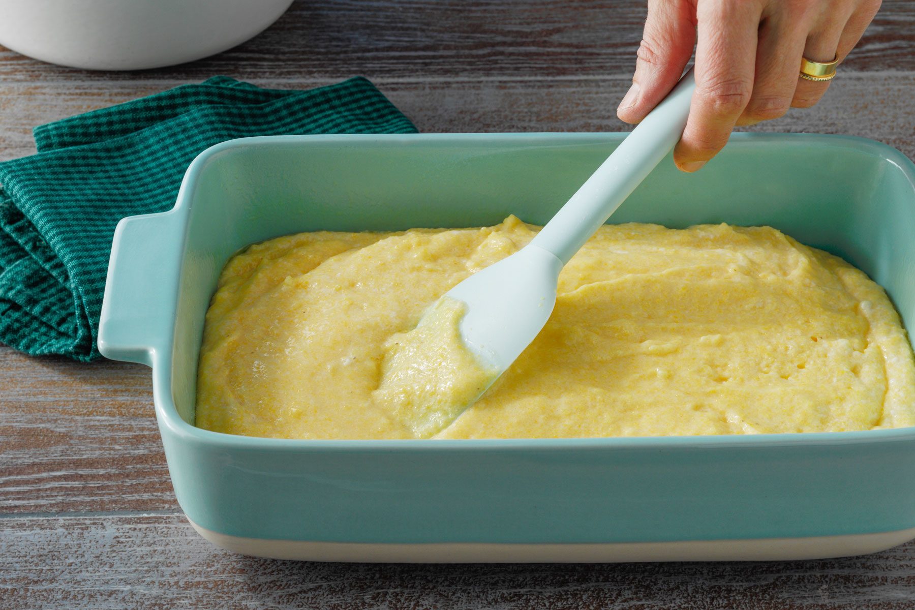 Cornmeal mixture in the greased baking dish