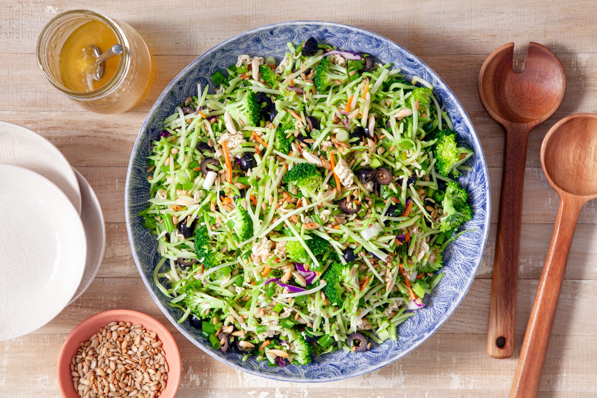 Ramen Coleslaw in a Fancy Blue Plate on Wooden Surface