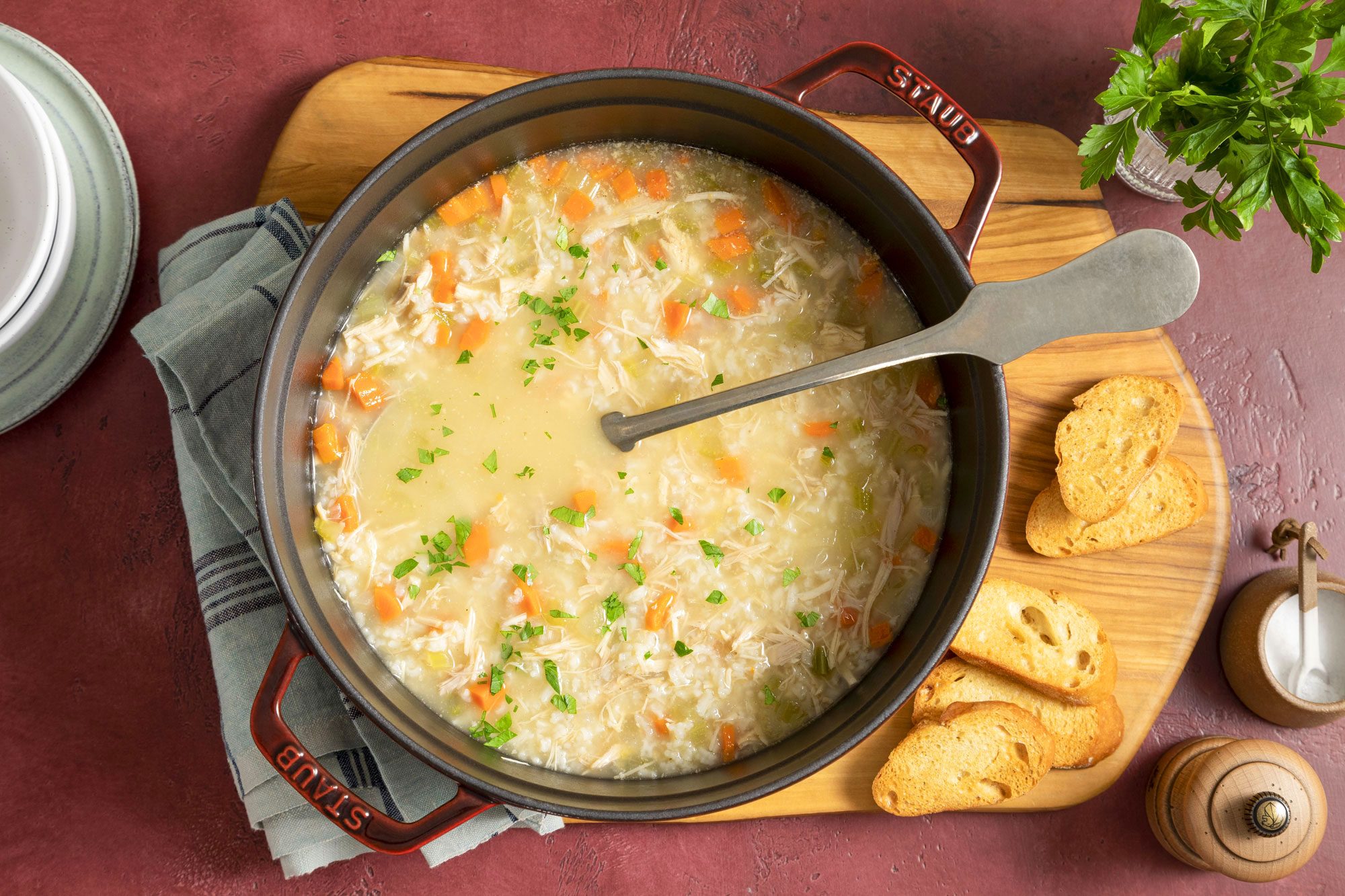 Turkey Soup in Soup Pot on Wooden Chopping Board