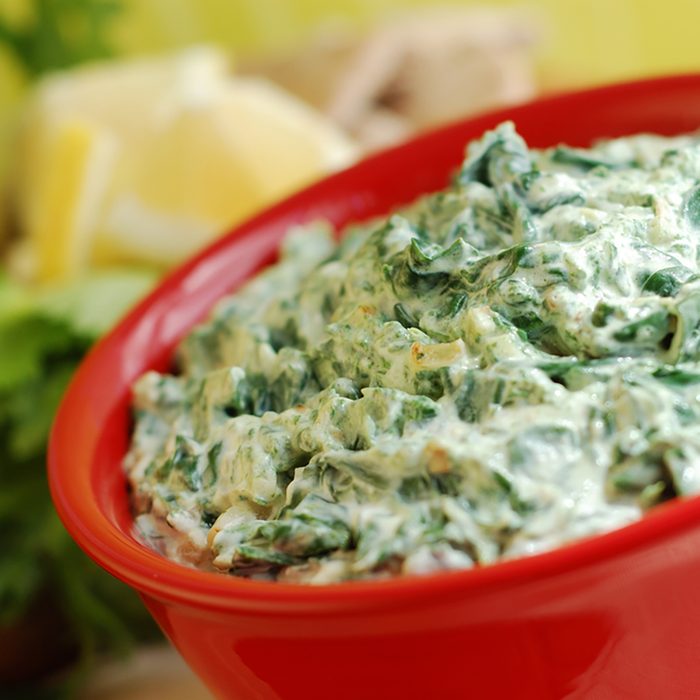 Bowl of fresh vegetarian spinach artichoke dip