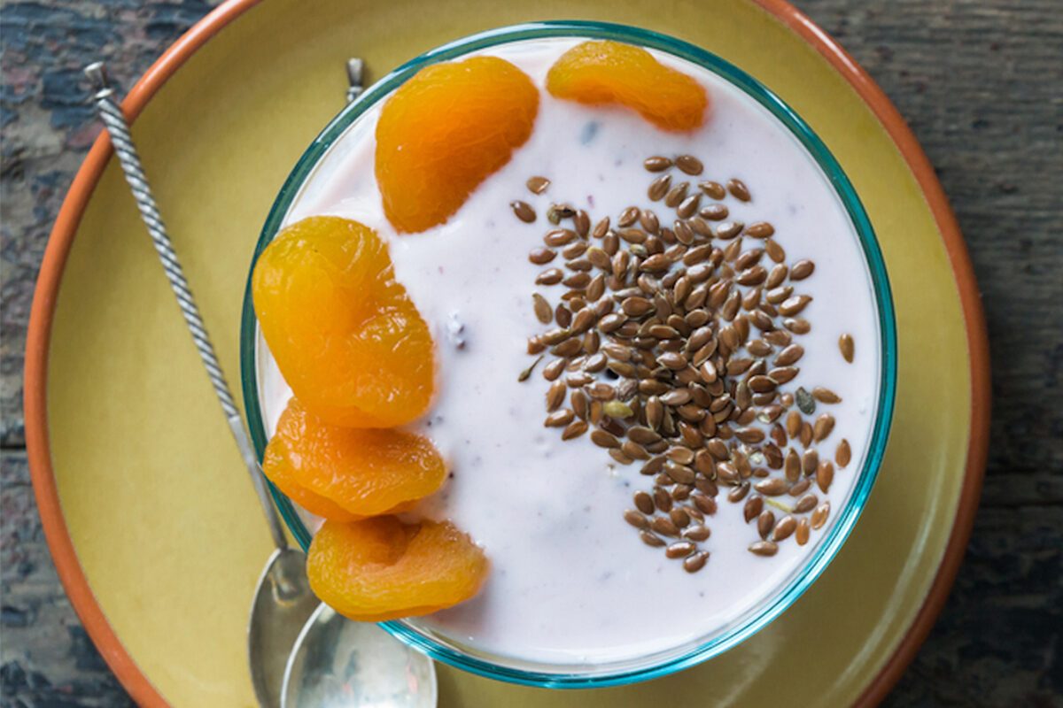 yogurt bowl with fruit and flaxseed