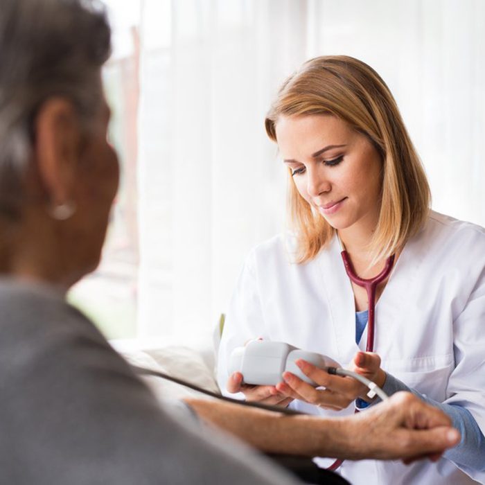 Doctor checking her patient