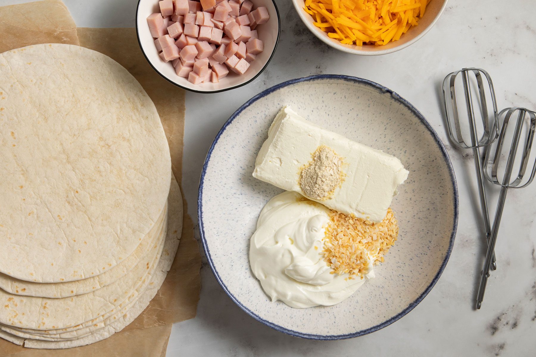 cream cheese, sour cream in a bid bowl with other Ingredients