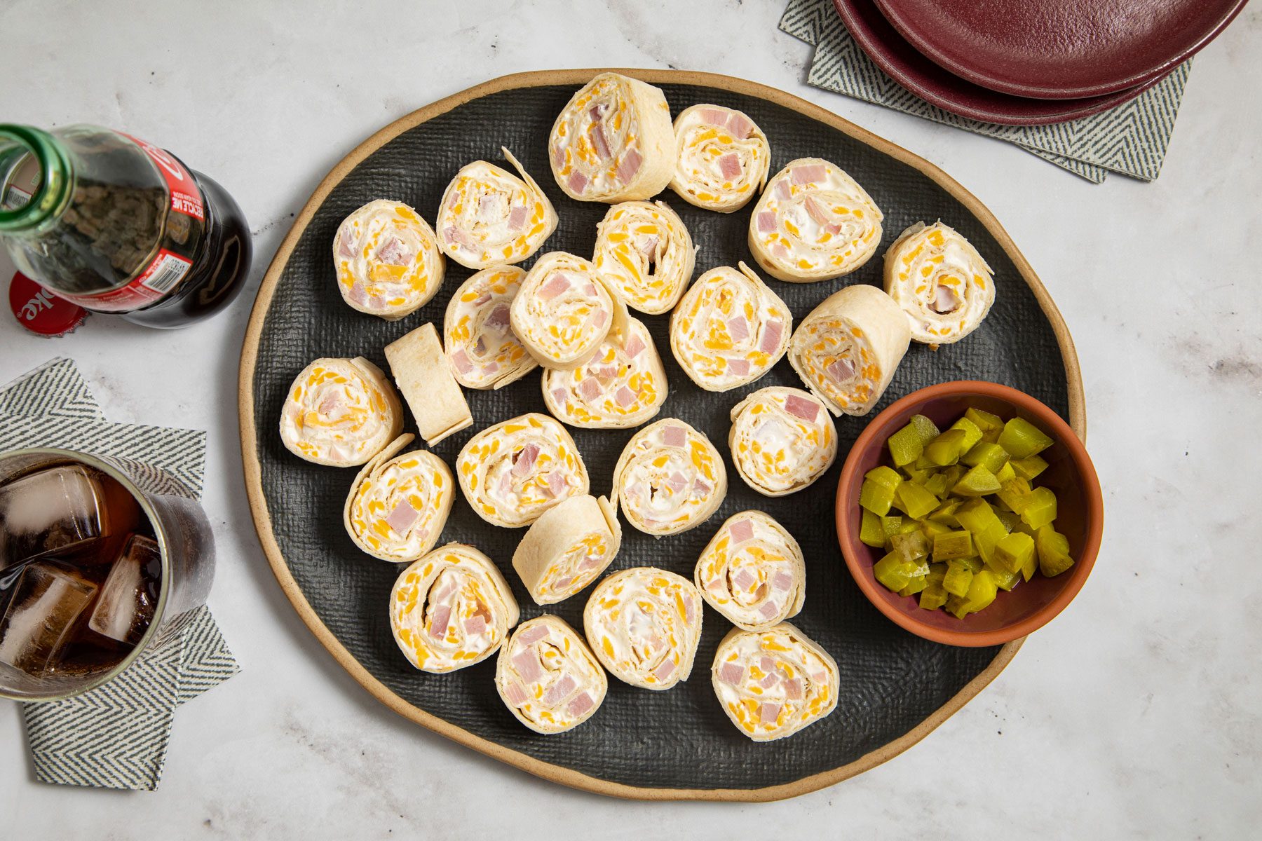 Ham And Cheese Roll Up served in a plate