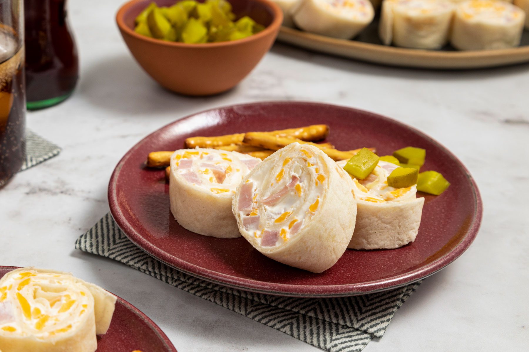 Ham And Cheese Roll Ups in a red plate