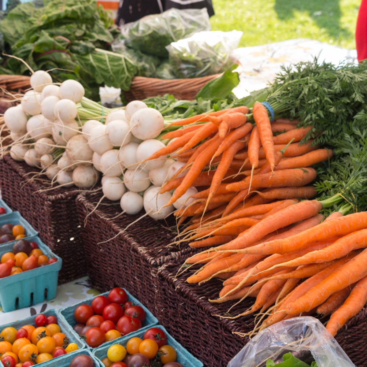 organic produce on sale at outdoor farmers market