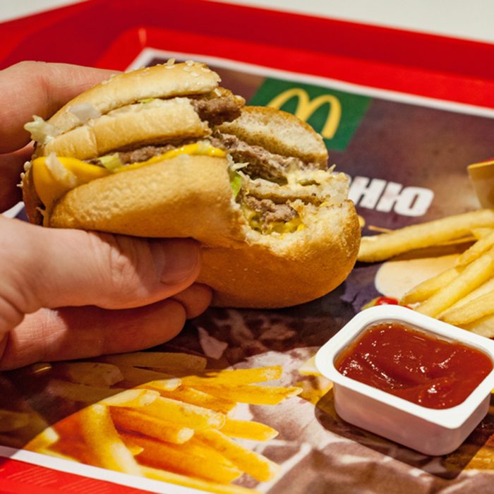 Man is eating at McDonald