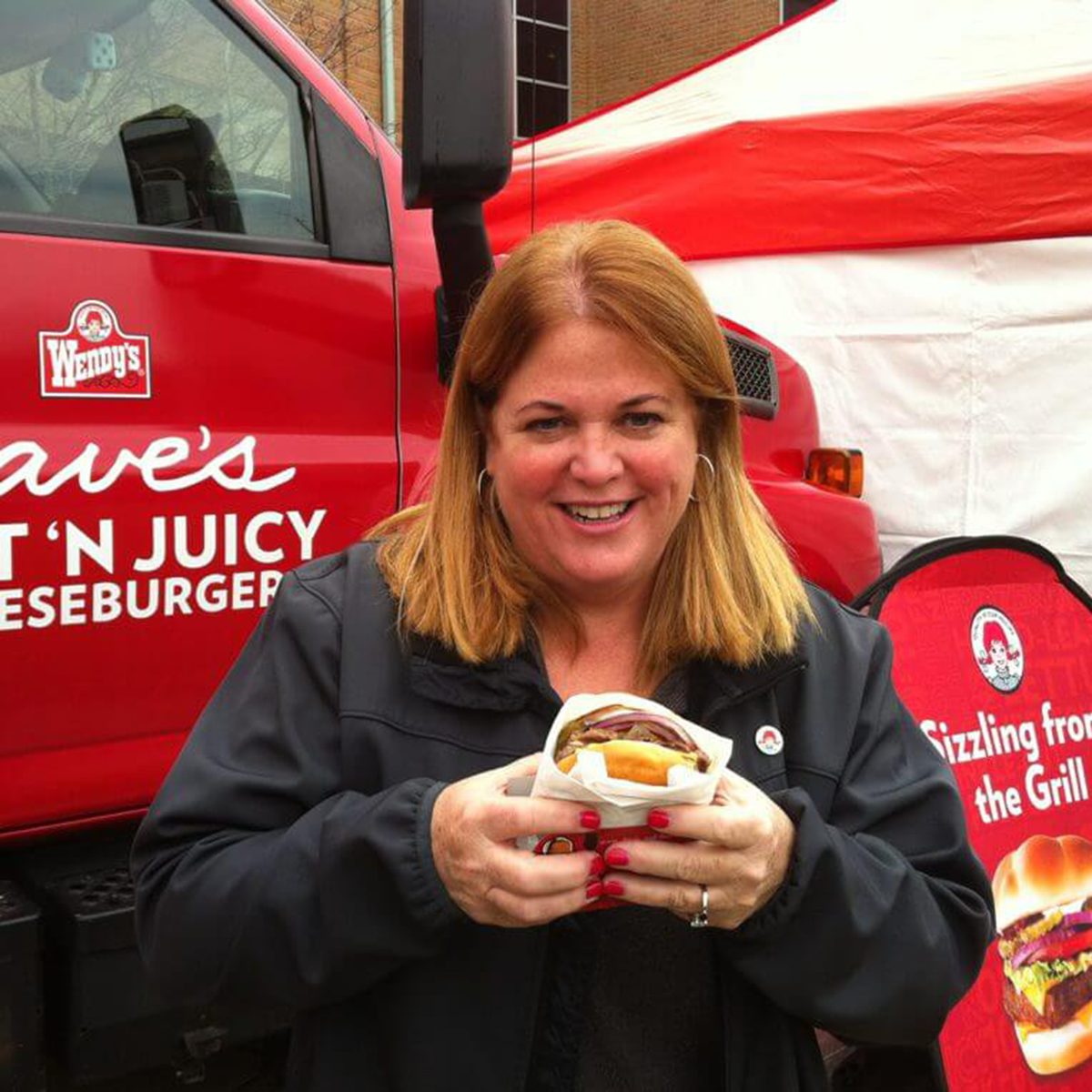 Wendy posing with burger