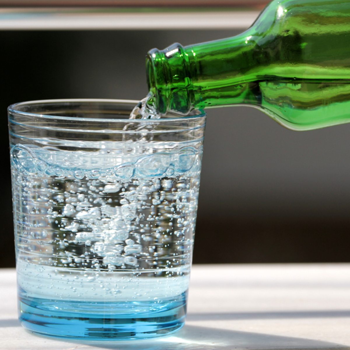 Pouring mineral water in the glass