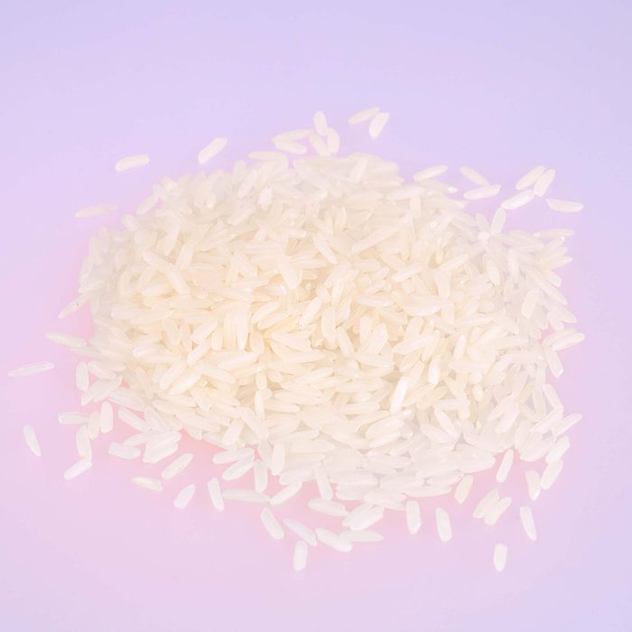 Basmati rice on a pile isolated on white background