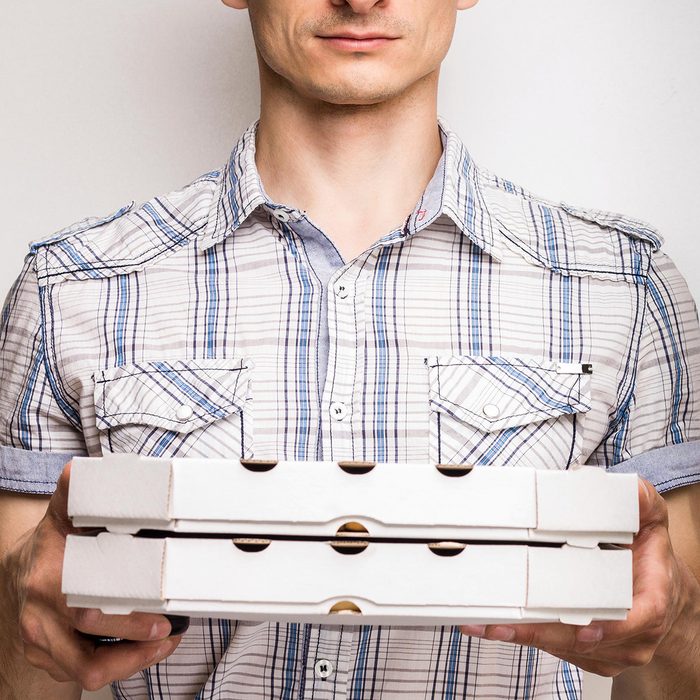 Pizza delivery courier in shirt