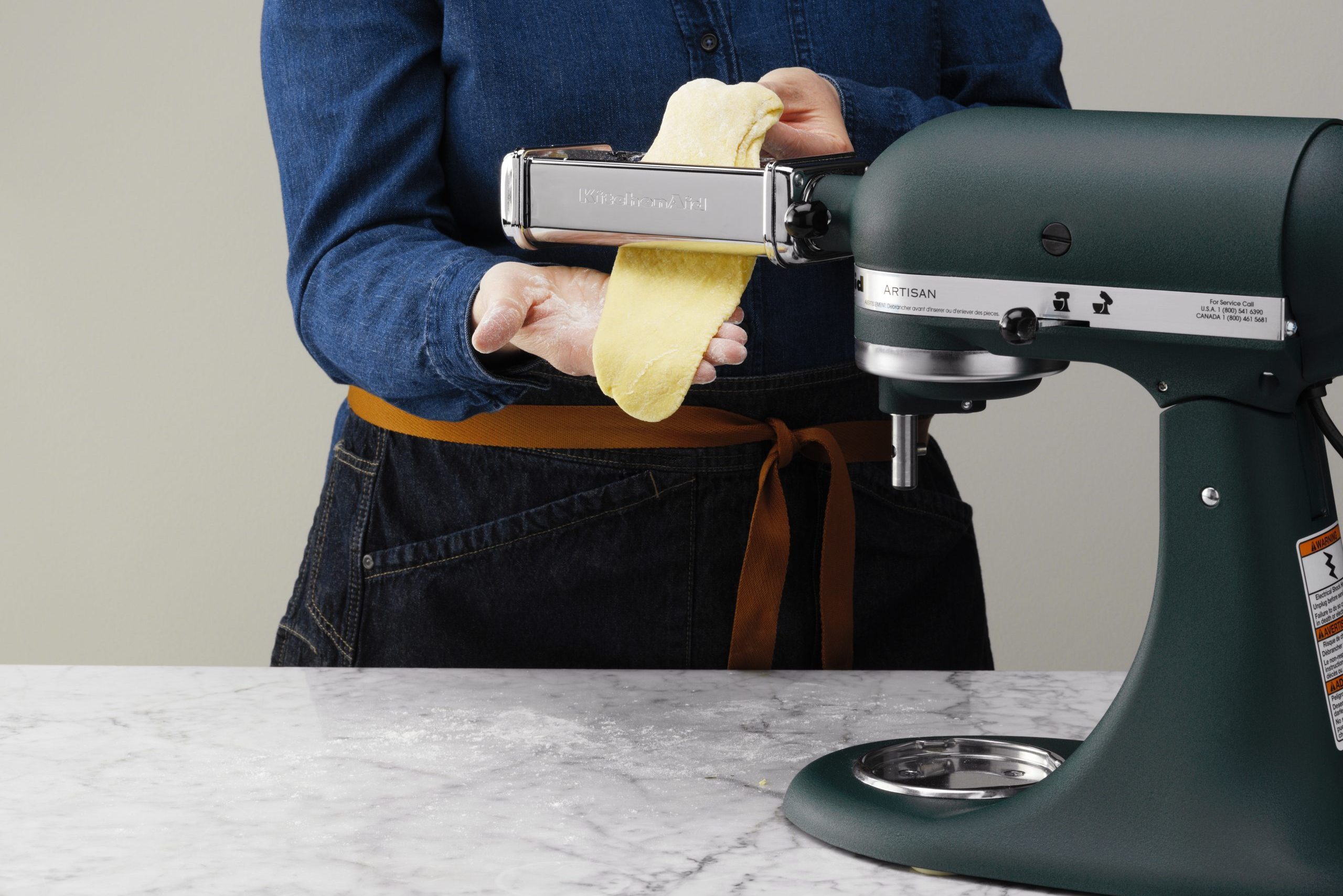 feed dough through the machine