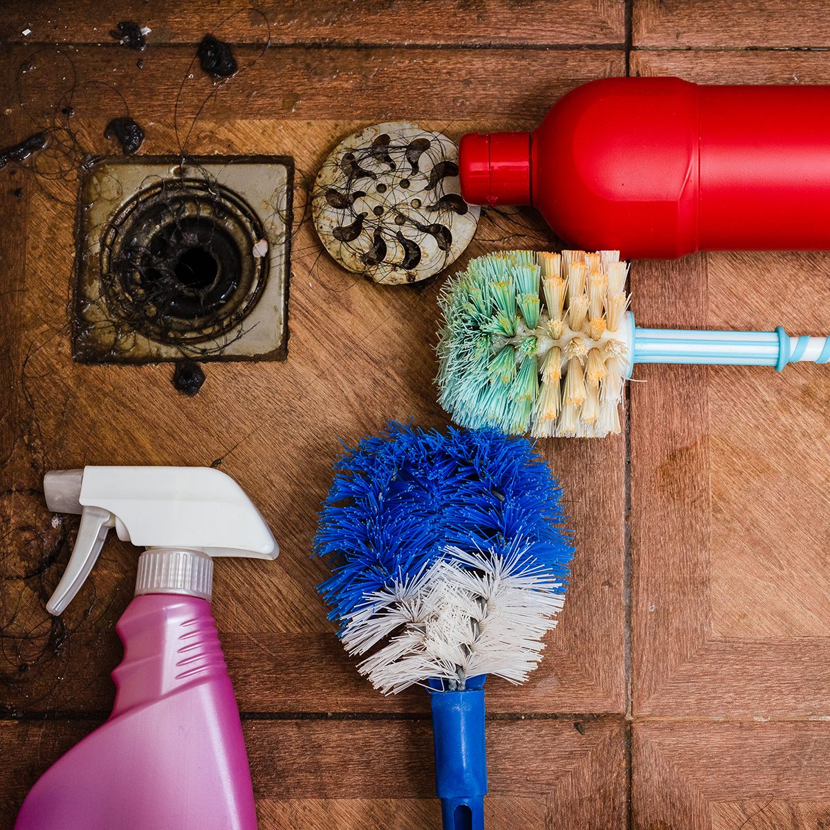 cleaning tool on dirty floor in bathroom