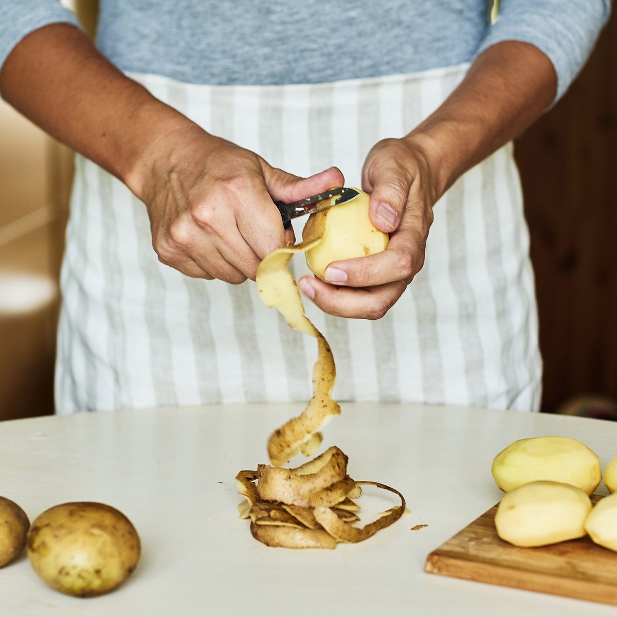 Peeling potatoes