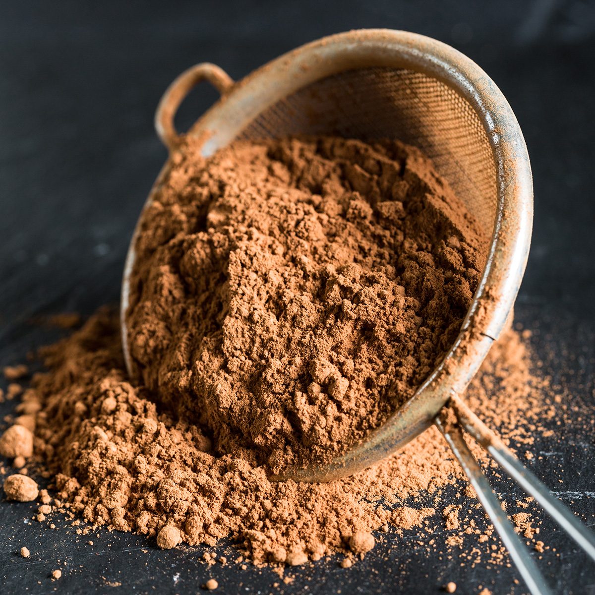 Cocoa powder in a sieve; Shutterstock ID 1308357037; Job (TFH, TOH, RD, BNB, CWM, CM): TOH