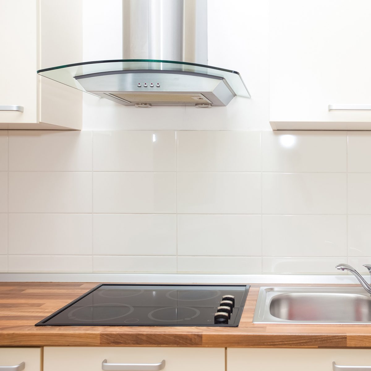 Modern and bright kitchen in house interior