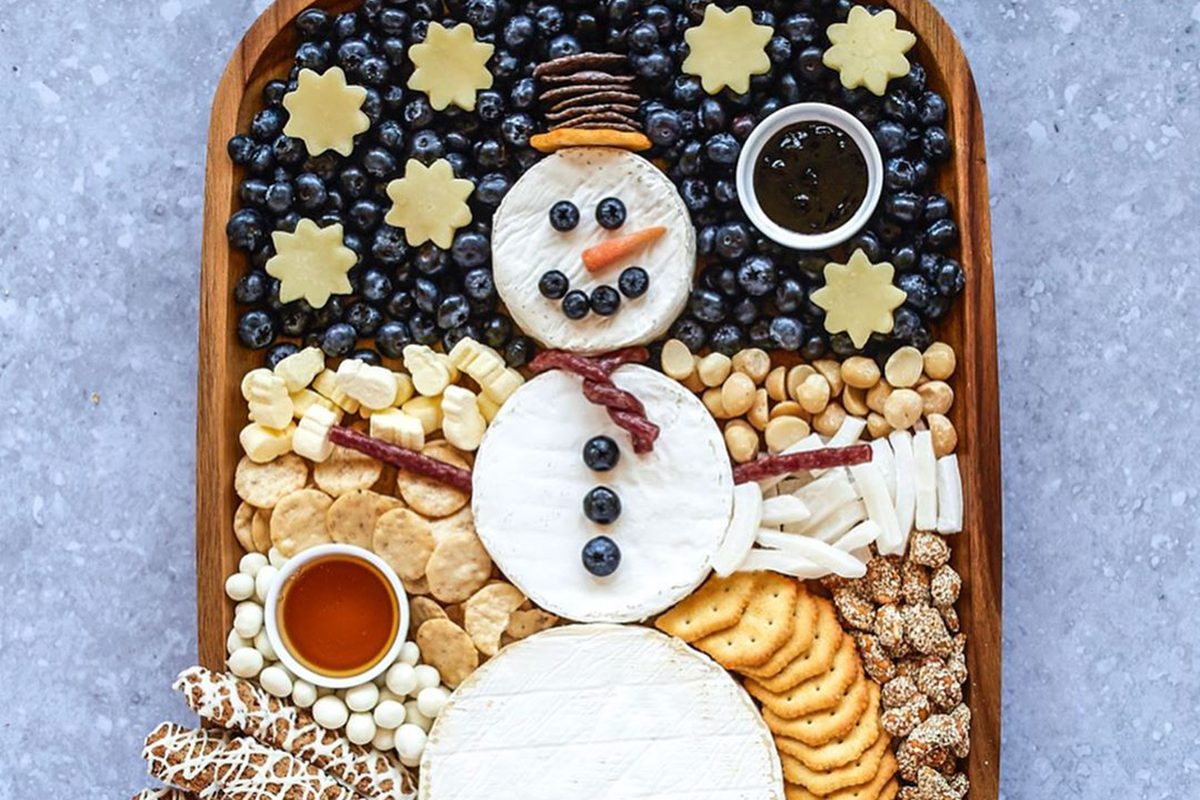This Snowman Cheese Board Is the Best Idea for a Holiday Party Appetizer