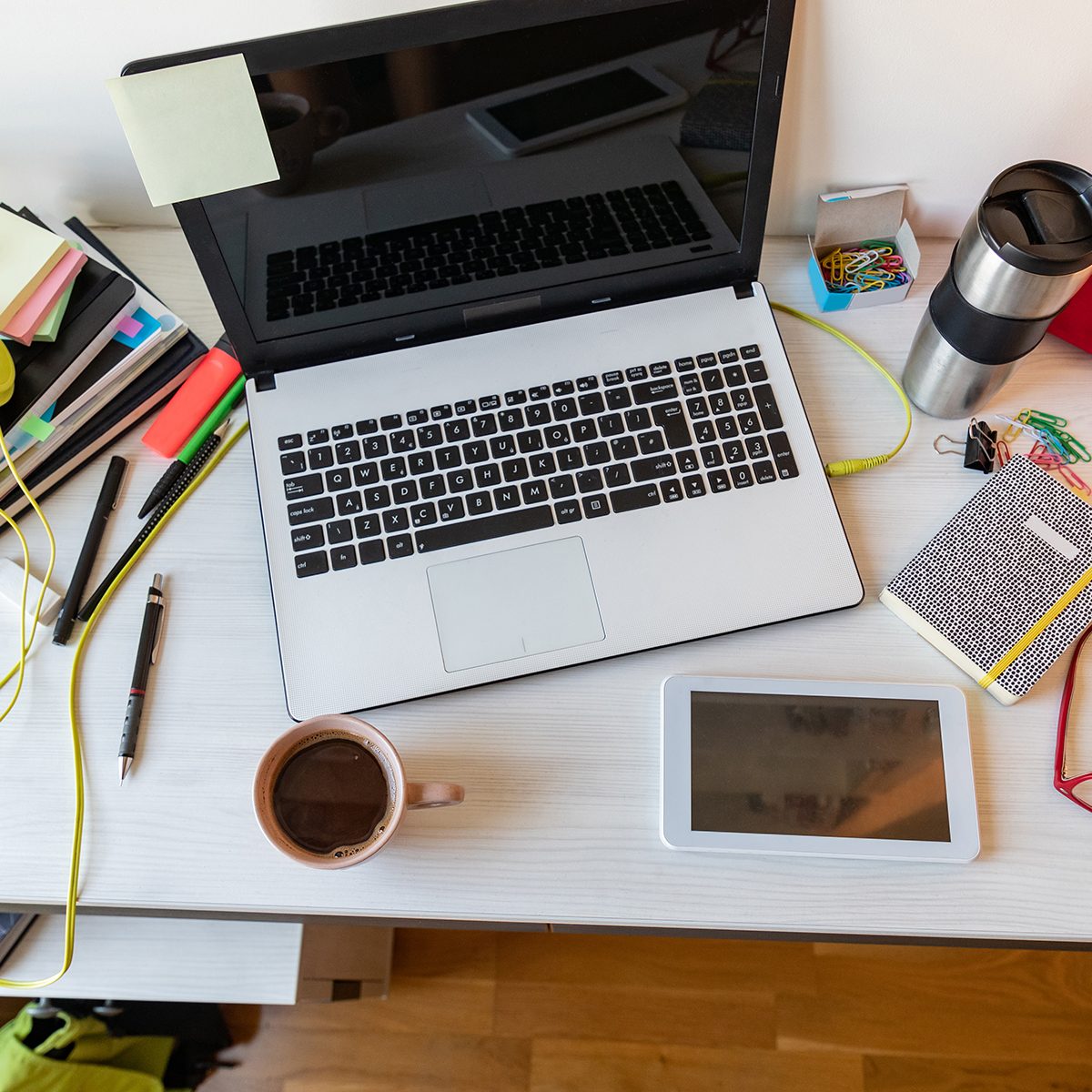 Directly above view of a messy desk at home office
