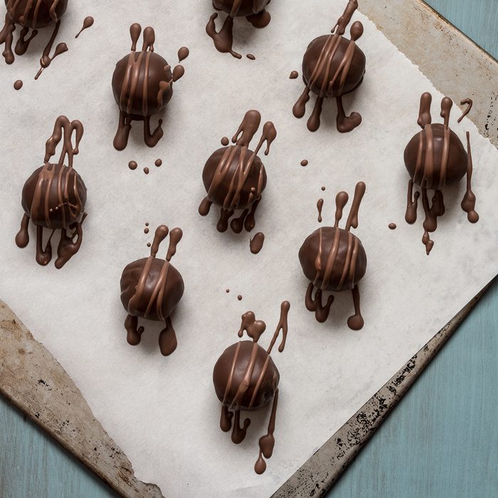 High Angle View Of Chocolate Truffles Arranged On Baking Tray