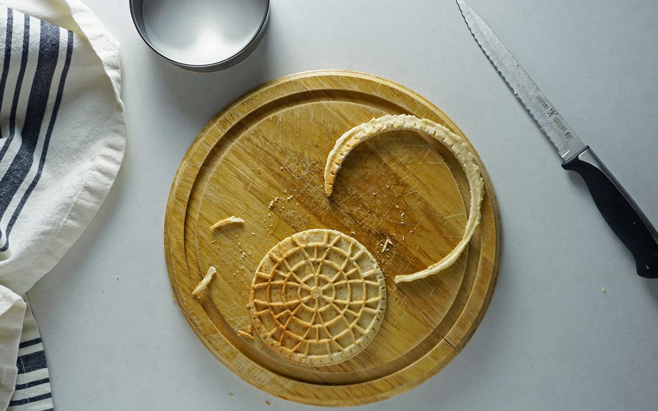 stroopwafel with rough edges trimmed away using a round cookie cutter