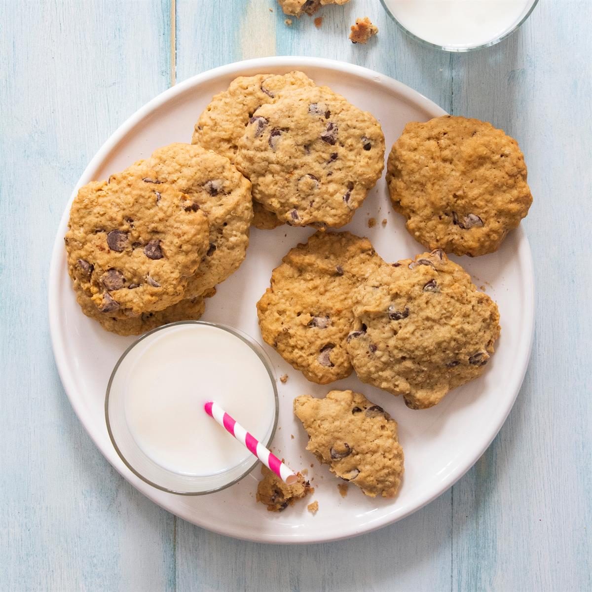 A plate of homemade sourdough oatmeal chocolate chip cookies.