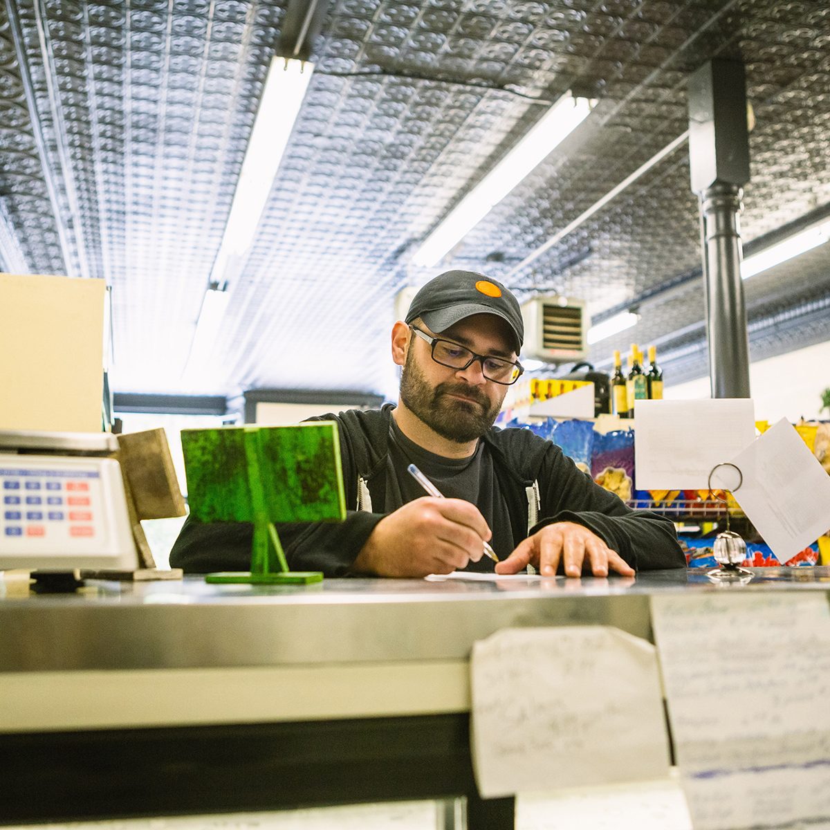 Customer in general store, Hague, USA