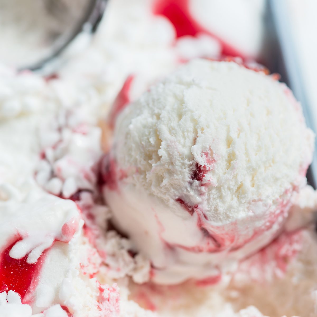 Scoop of Vanilla Berry Ice Cream in the Container, close up image