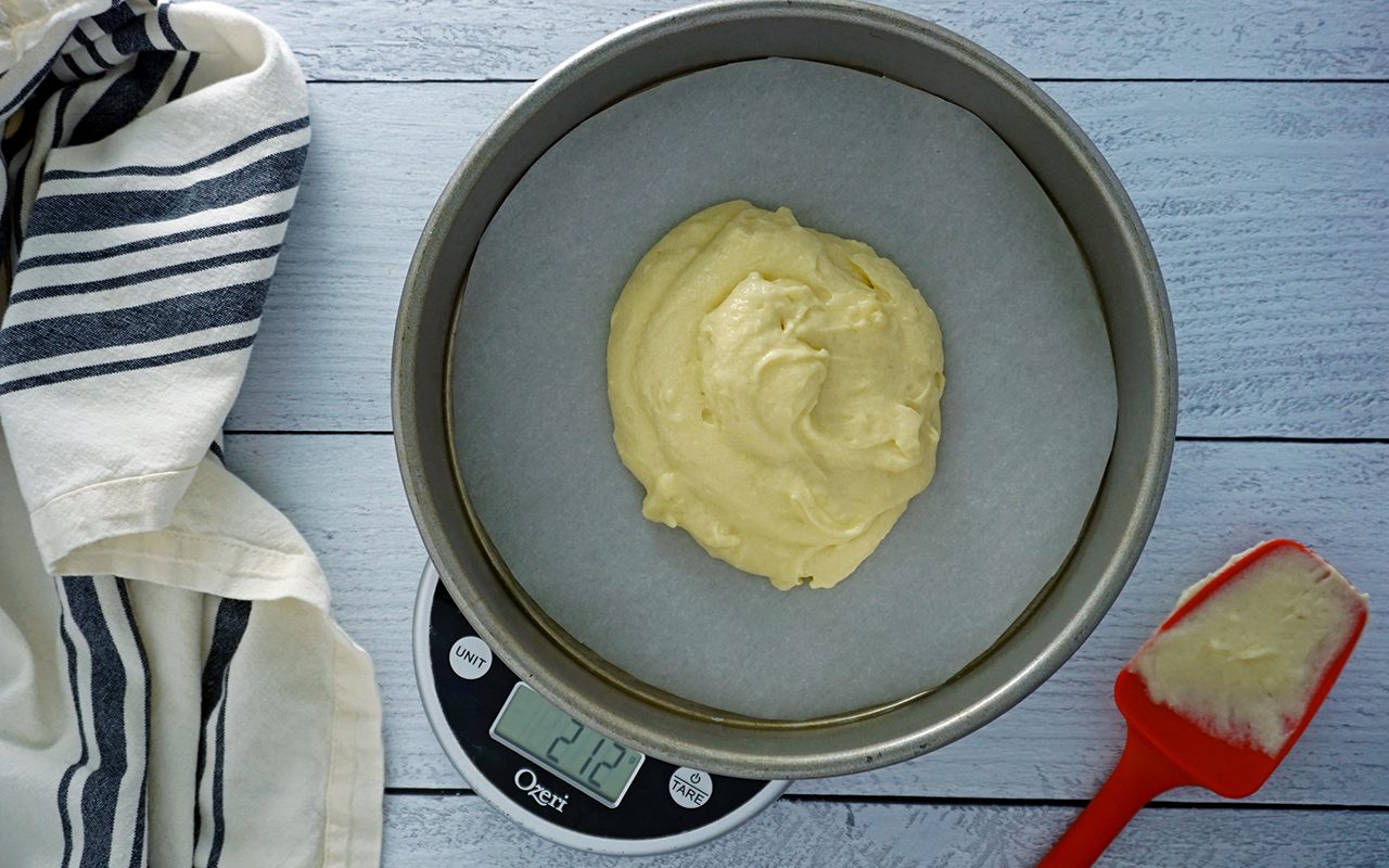 weighing smith island cake batter for even layers
