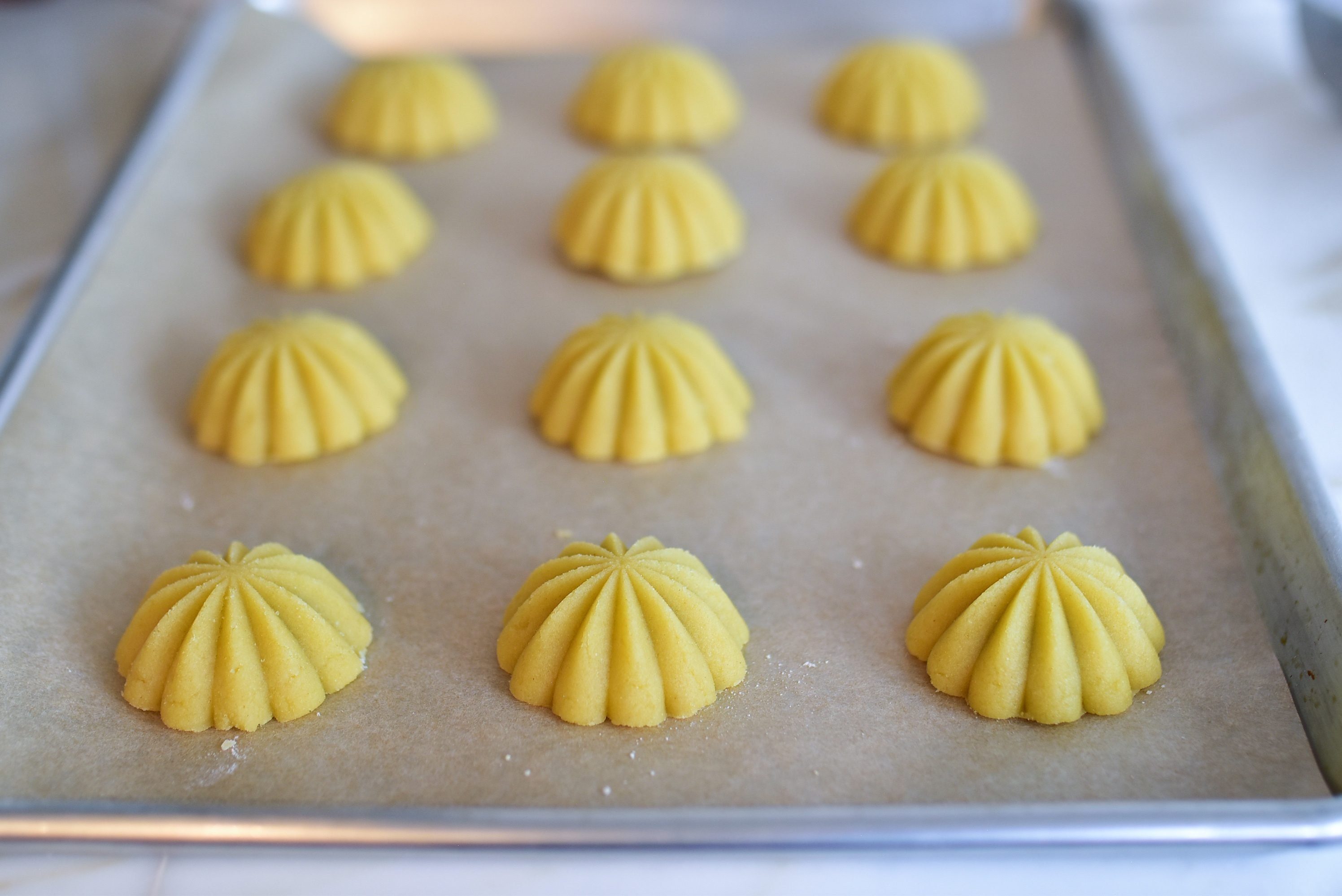 Ma'amoul semolina cookies shaped and ready to bake.