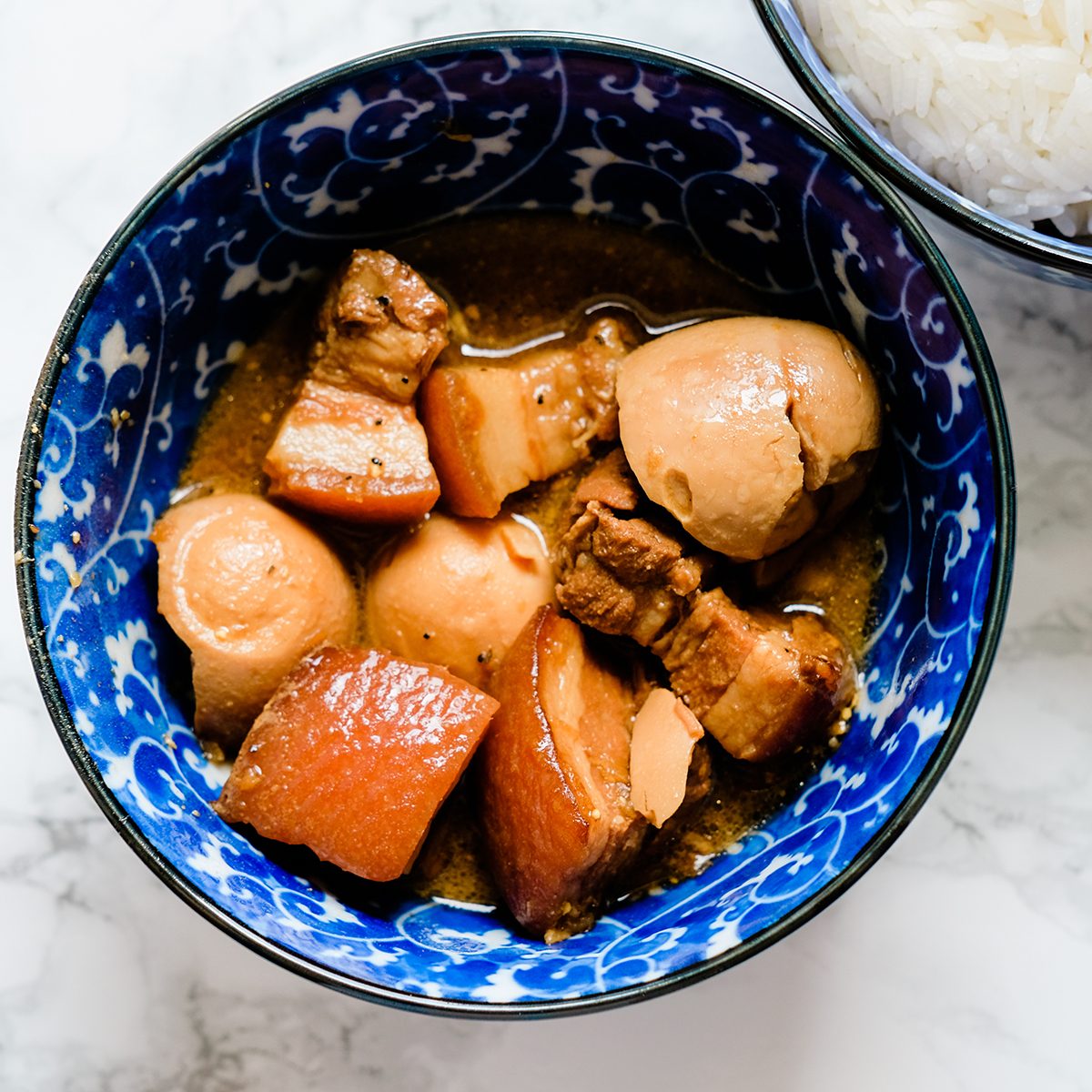 vietnamese recipes A Bowl Of Thit Kho Trung (vietnamese Caramelized Pork And Eggs Cooked With Coconut Water)
