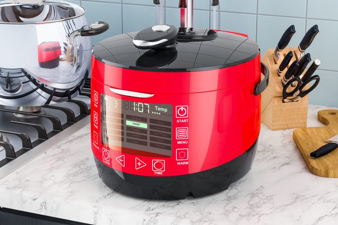 Automatic Multicooker On The Kitchen Table. 3d Rendering
