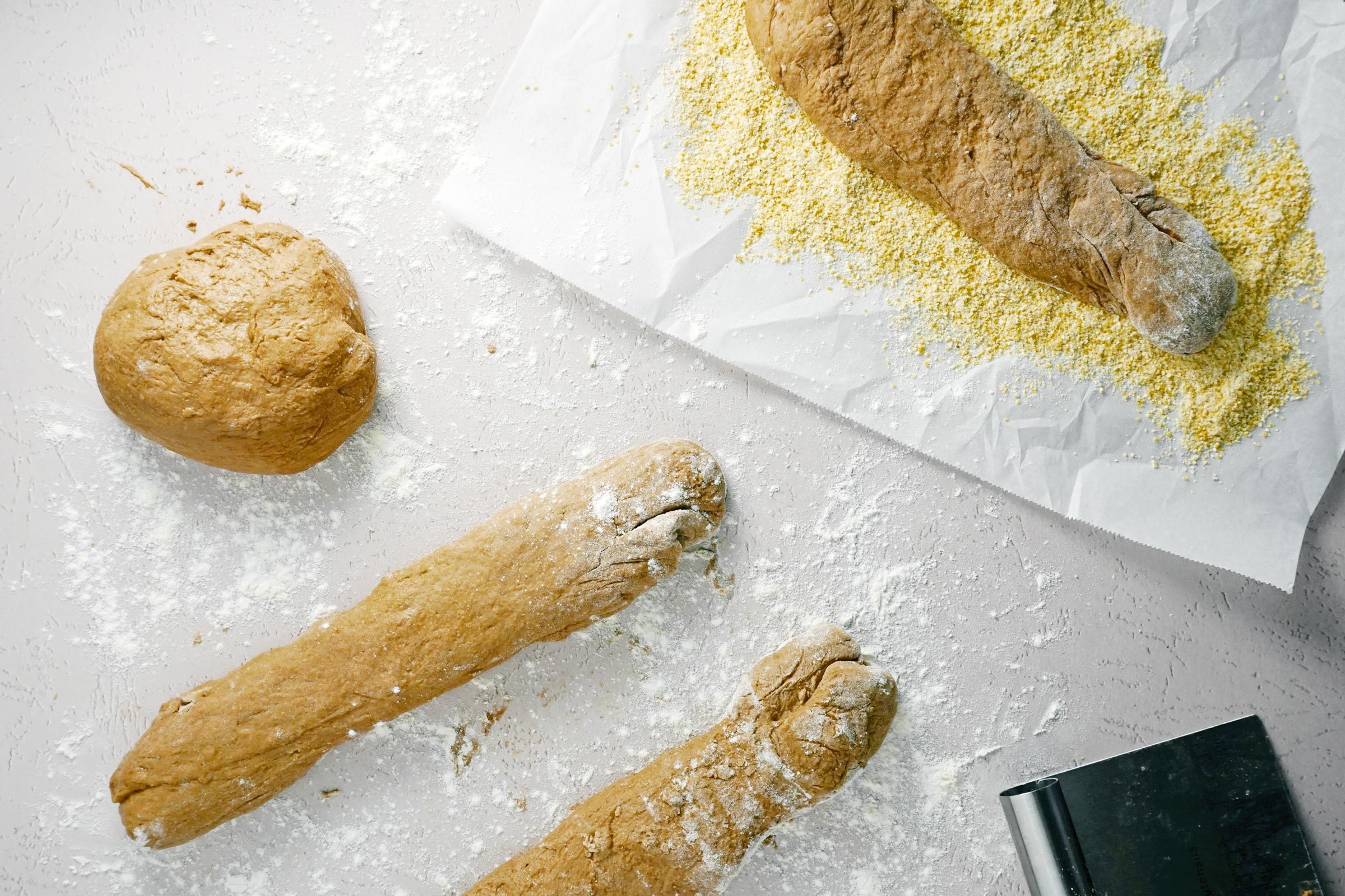 Cheesecake Factory Brown Bread raw dough rolled into loaf shapes