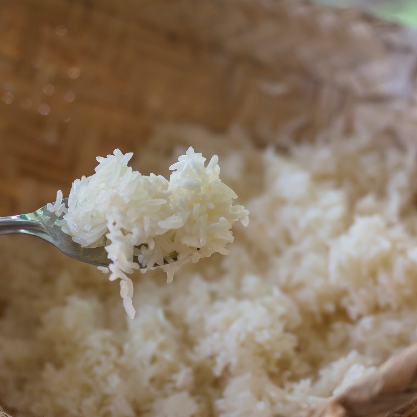 Hot sticky rice in old wooden steamer