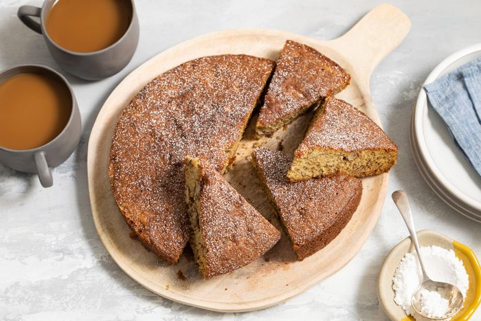 Slices of Air Fryer Banana Bread served in a plate with hot chocolate