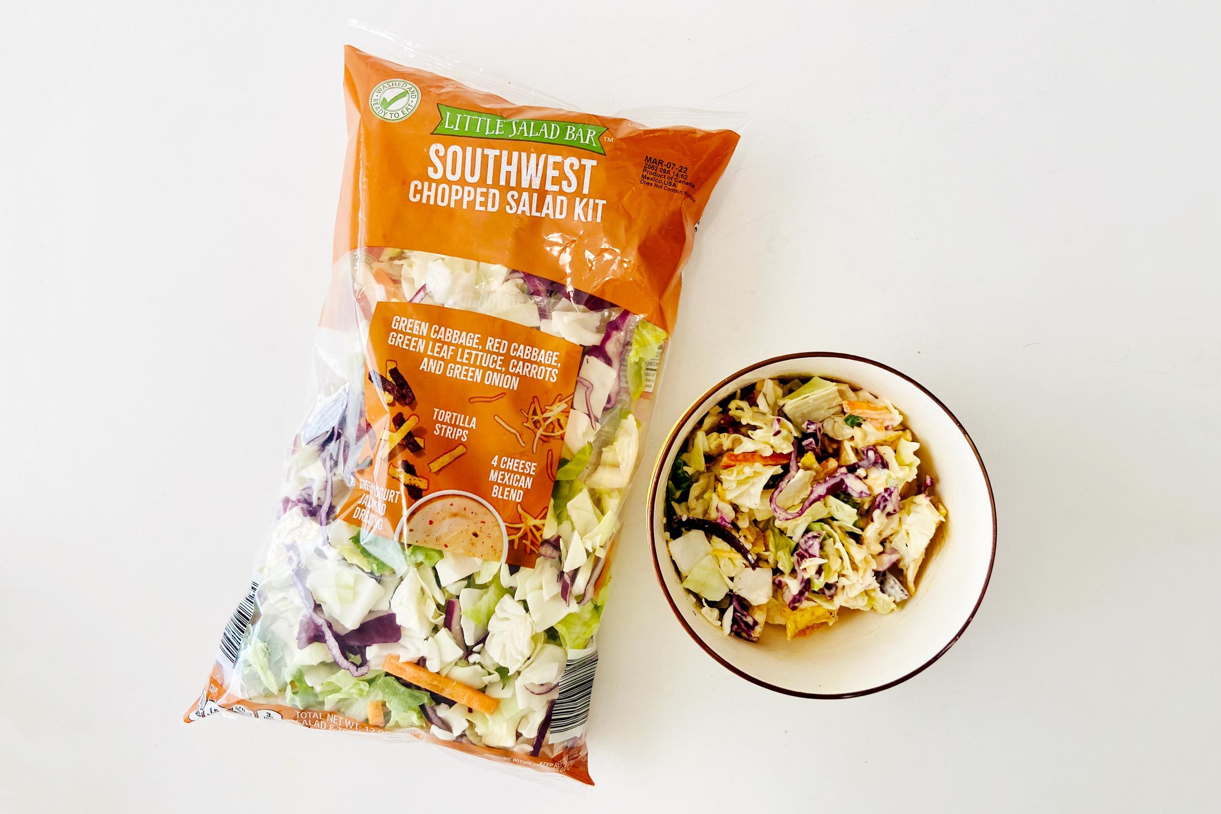 Little Salad Bar salad bag with a bowl of Salad