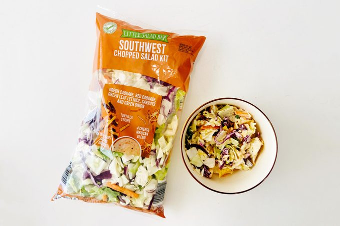 Little Salad Bar salad bag with a bowl of Salad