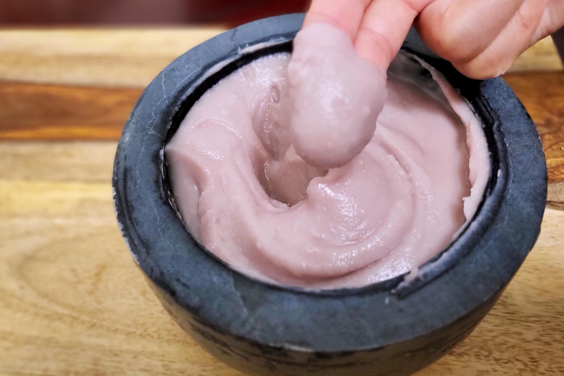 two fingers with the consistency of poi