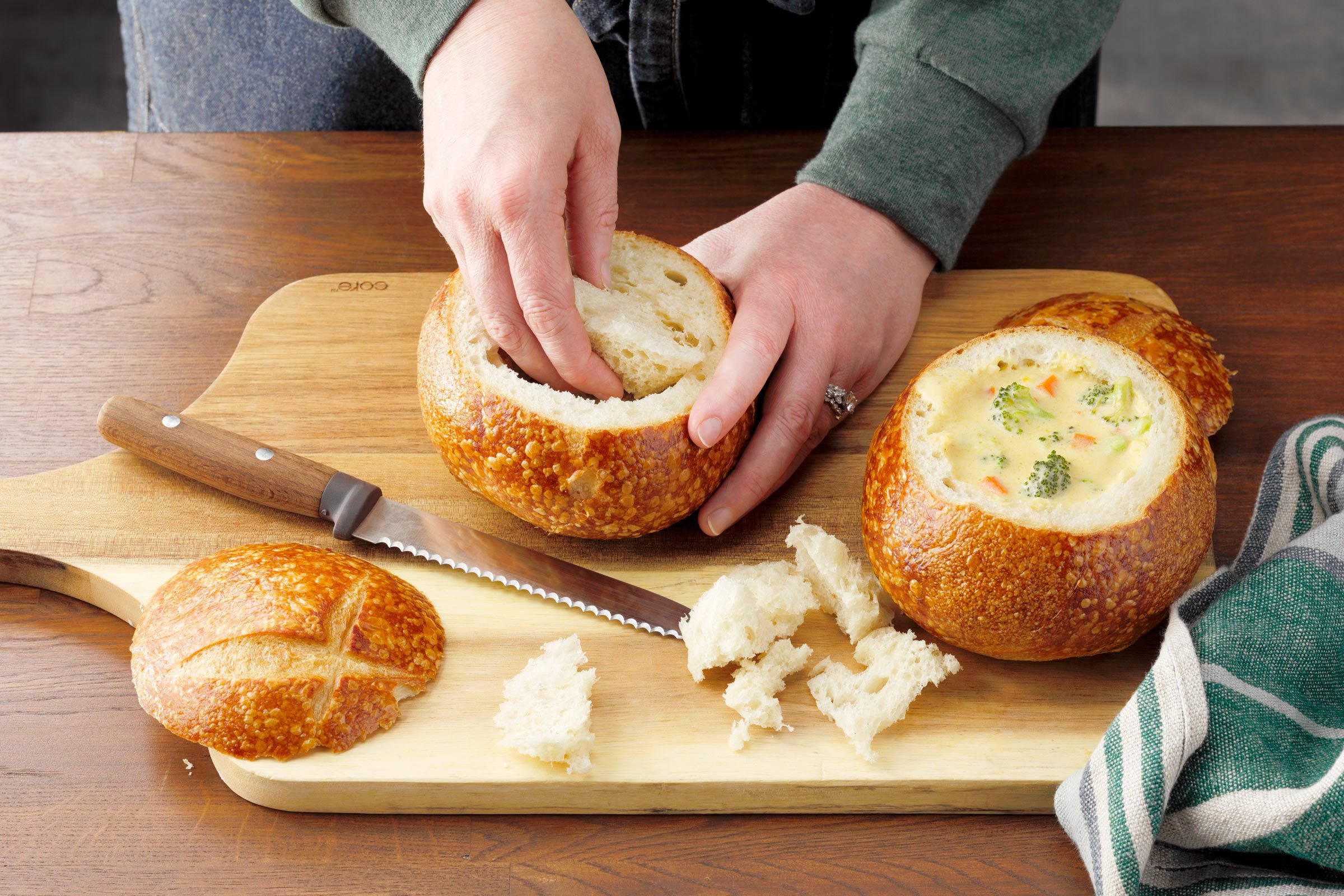 carving out a bread bowl