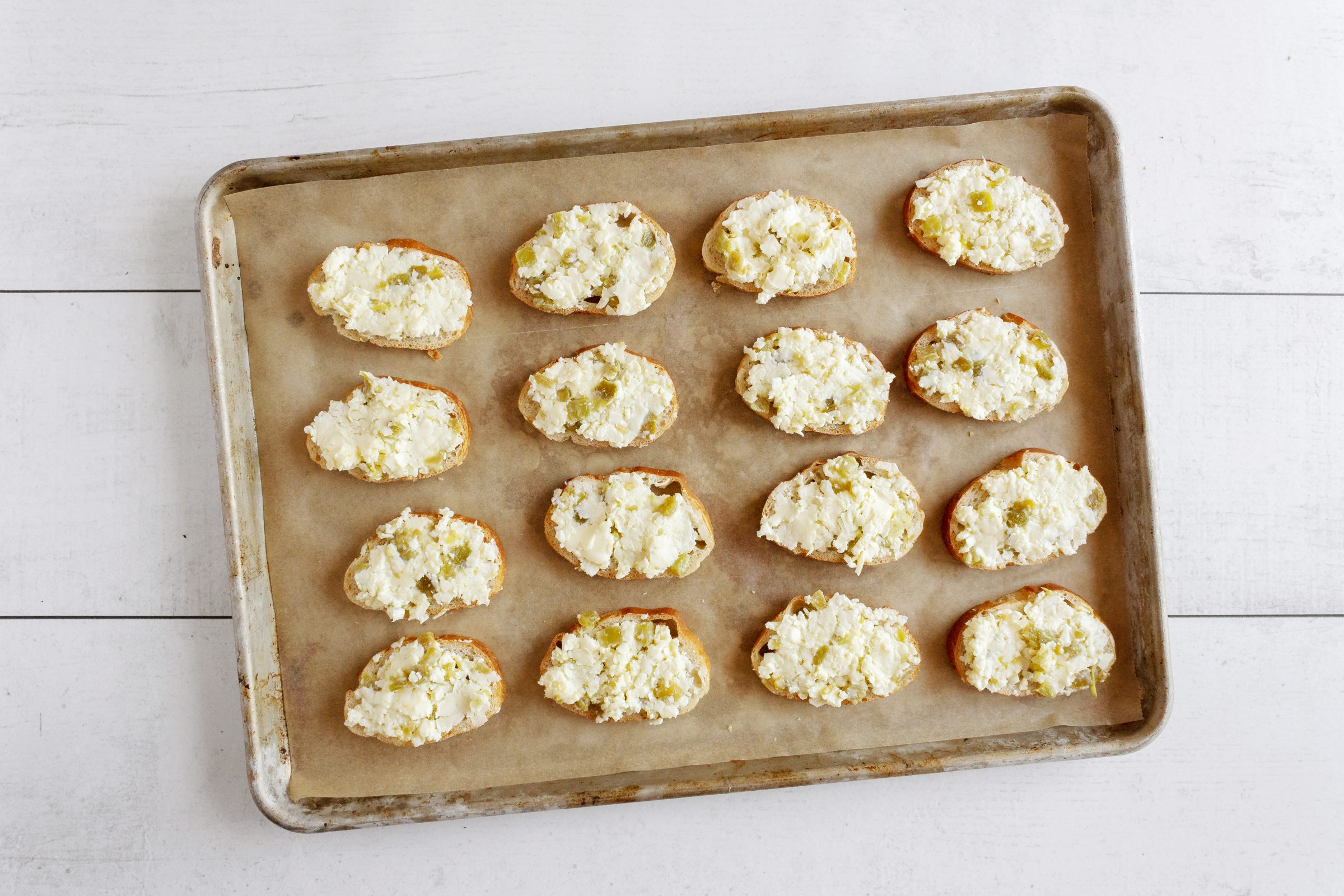 spread cheese onto bread for Josephinas