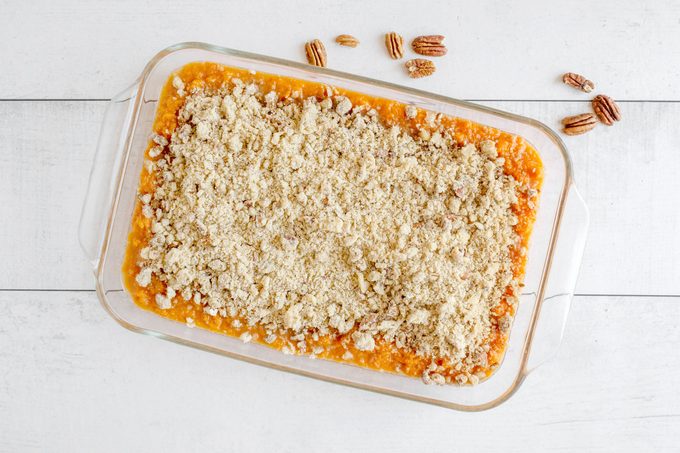 Pioneer Womans Soul Sweet Potatoes in a baking dish before being baked