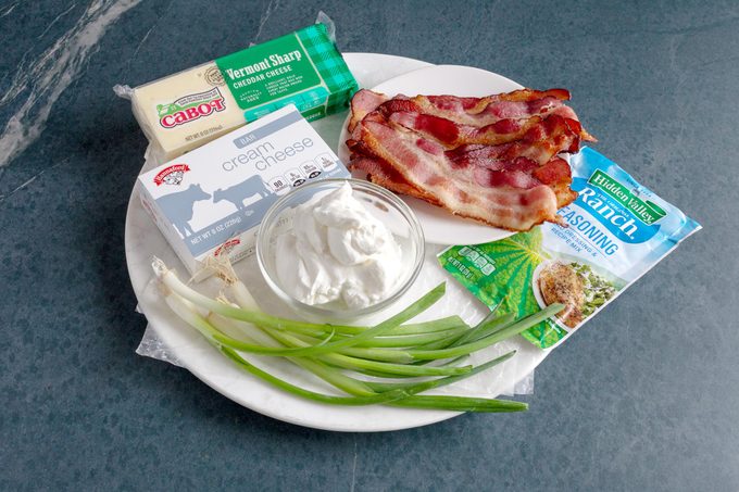 ingredients on a plate to make a cheese ball