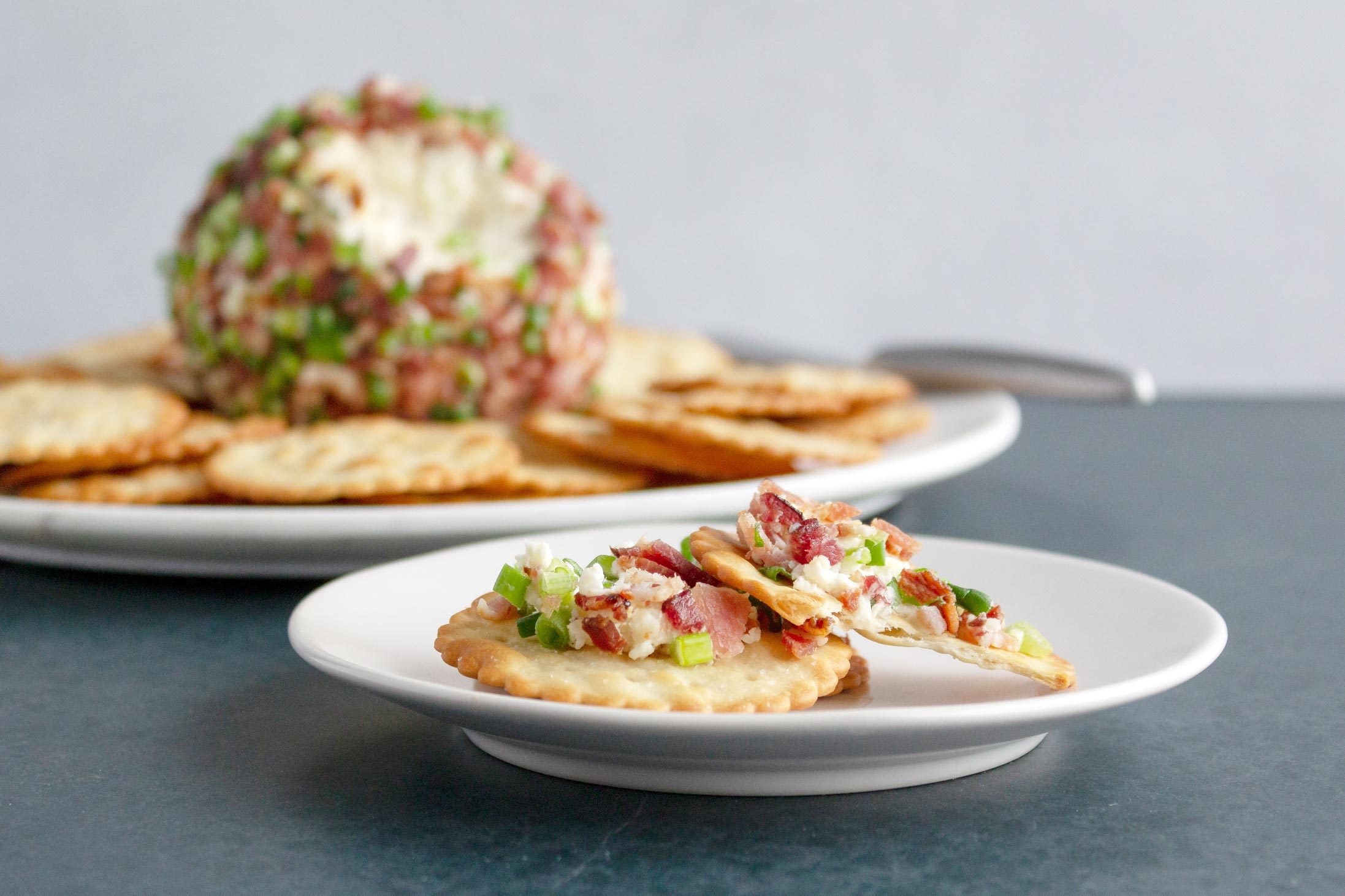 crackers with cheese spread onto it