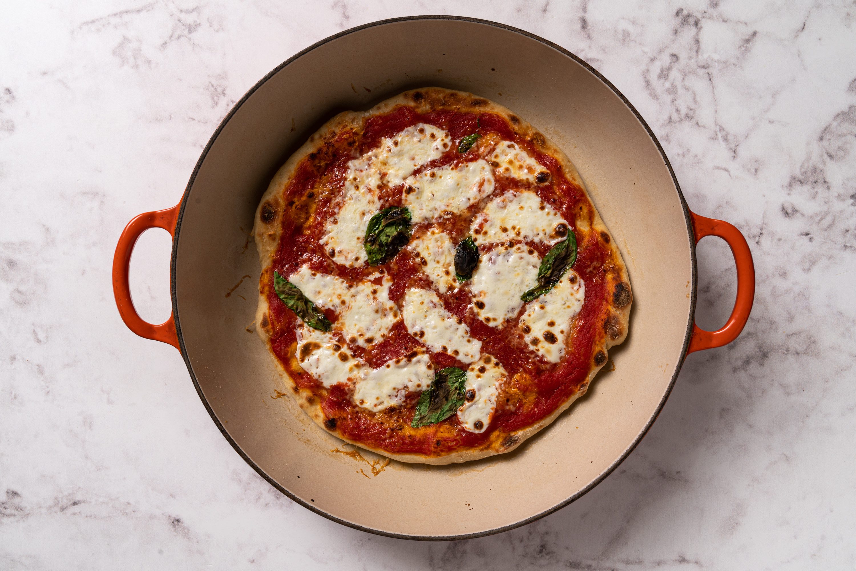 broiled pizza in skillet