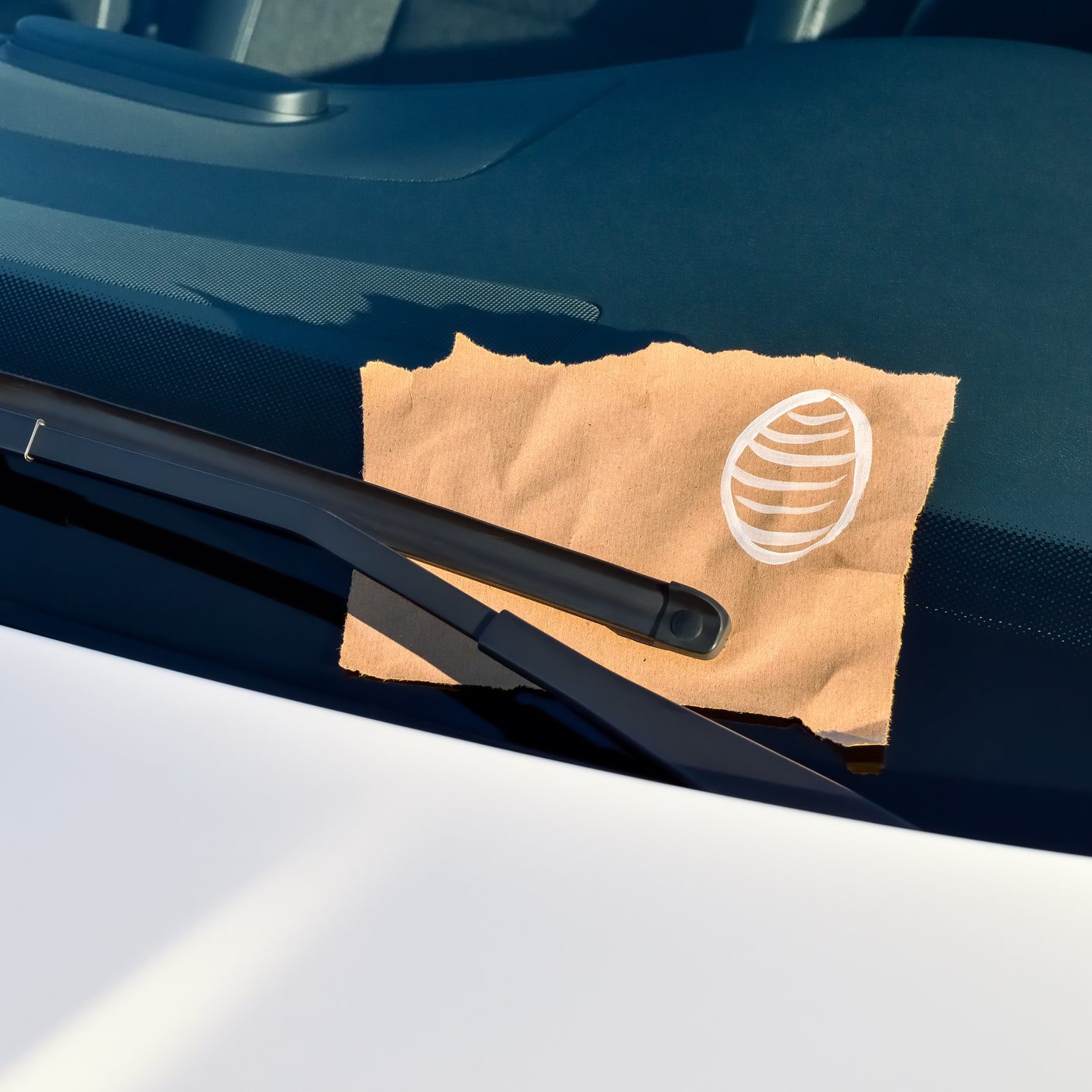 Easter clue Message under a Windshield Wiper