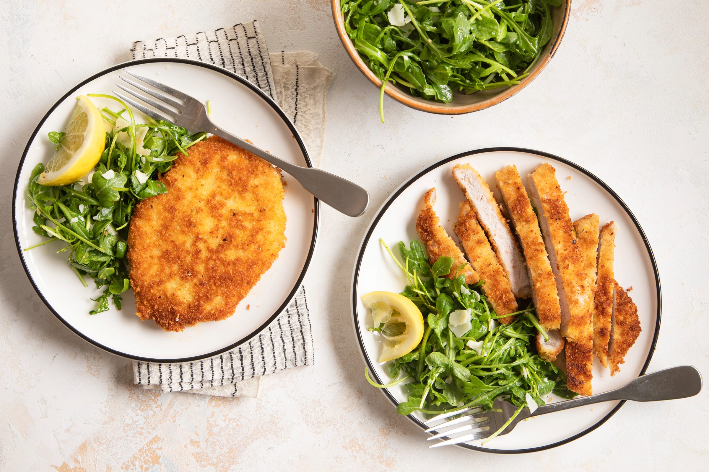 Pork Milanese on two plates